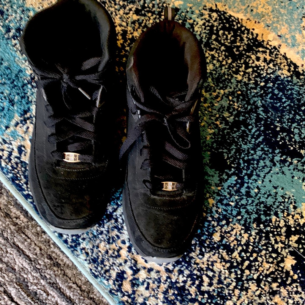 it’s new black shoes that i bought a week ago. it doesn’t fit me